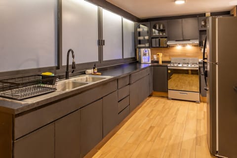 Cook your favorite meals in a modern, fully equipped kitchen.