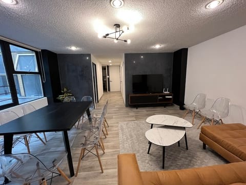 The sitting room and dining area offer lots of seating for everyone.