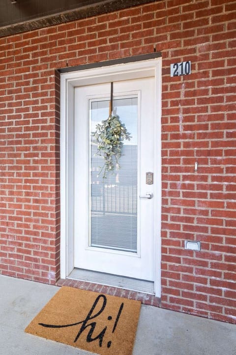 Park for free in the well-lit, designated lot.
Keyless entry on the door lock.