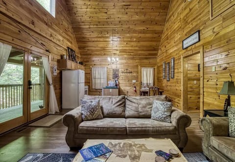 Living Room: Bask in warm woods and bright light, perfect for game nights and gathering memories!