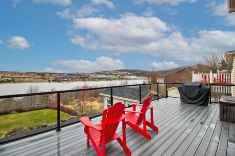 Scenic deck with sweeping views, ideal for relaxation and outdoor dining.






