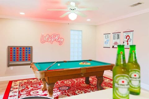 The pool table is waiting for you at Pondside Funhouse, our vacation retreat in Pinellas Park, FL. Relax with a chilled beverage, snack on treats, and engage in friendly competition. Book our home today!