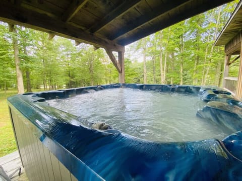 Indulge in the serenity of nature as you relax in this impeccably maintained hot tub, where every soak becomes a rejuvenating escape for your mind and body.