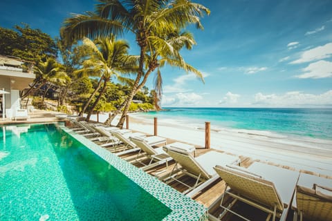 Outdoor pool, pool umbrellas, sun loungers