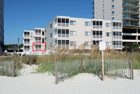 First-floor condo steps from the sand — easy access and no elevator