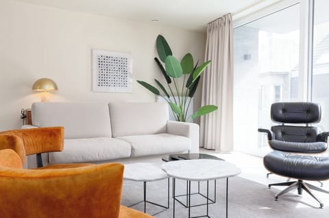 Deluxe Apartment, 2 Bedrooms, Balcony, City View | Living area | 43-inch Smart TV with digital channels
