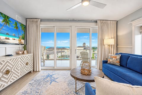 Relax and unwind in the coastal living room while enjoying beautiful Gulf views!