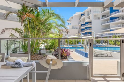 Relax with stunning ocean views from your private balcony, complete with comfortable outdoor seating