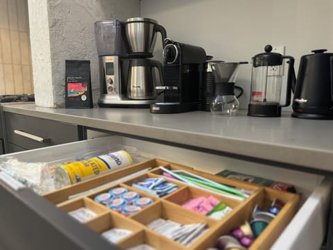Coffee bar: drip, pour-over, French press, Nespresso, tea, and starter supplies.