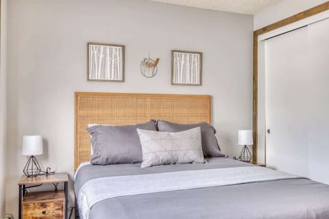 Slip into soft sheets and restful vibes in this light-filled private bedroom.