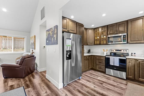 Whip up delightful meals in your modern kitchen! Fully equipped for your convenience, it's perfect for a seamless mountain escape. Culinary ease with Cascadia Getaways!