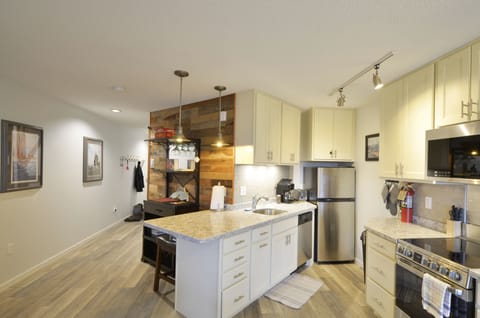 It's a small kitchen but it's fully functional...and there's a surprising amount of counter space!