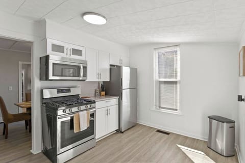 Savor the simplicity of our fully-equipped kitchen with sleek, stainless steel appliances and a fresh, clean design.