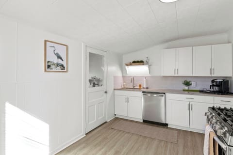 Savor the simplicity of our fully-equipped kitchen with sleek, stainless steel appliances and a fresh, clean design.