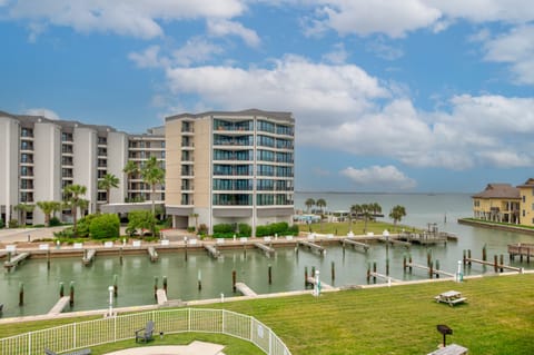 Waterfront vacation rental complex featuring private boat docks and marina access for the perfect coastal getaway.
