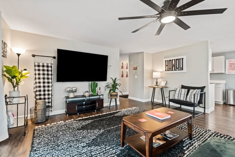 Relax with your favorite shows on a 75-inch Roku TV.