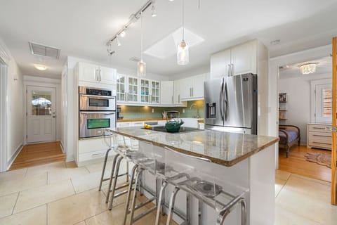 Pull up a seat and unwind at our stylish bar area with comfortable bar stools