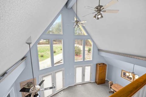 Spacious Living room with sectional sofa and dining area. Access to deck.