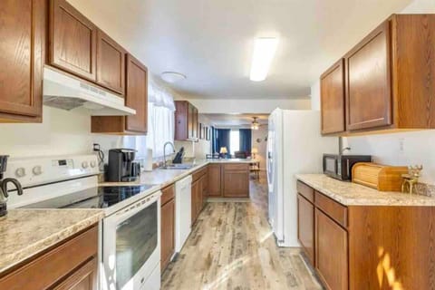 Kitchen views from the mud room, with everything you need to cook, bake, and enjoy during your stay.