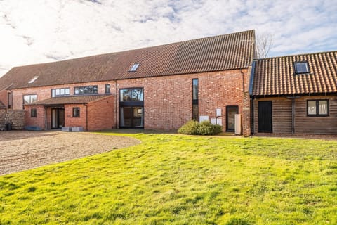 Peak Hall, Tittleshall: The original grain barn for the farm, tastefully converted