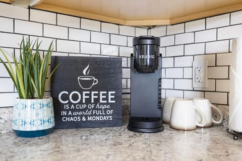 Start your mornings right in the cozy coffee nook, complete with everything you need for the perfect brew.