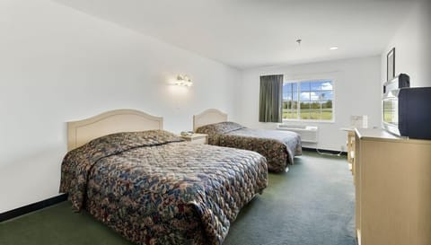 Desk, laptop workspace, blackout drapes, iron/ironing board