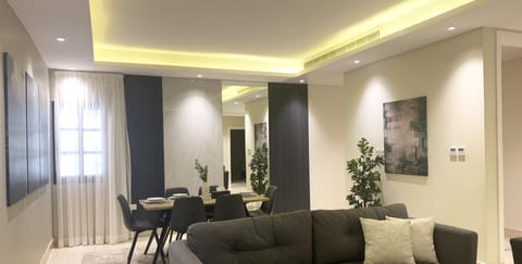 Design Apartment, 3 Bedrooms | Living area | Flat-screen TV