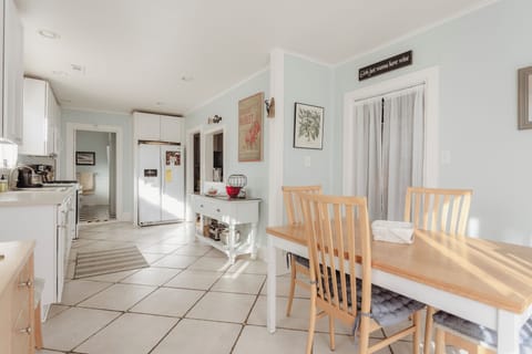 Kitchen dining area which leads to a lovely screen porch