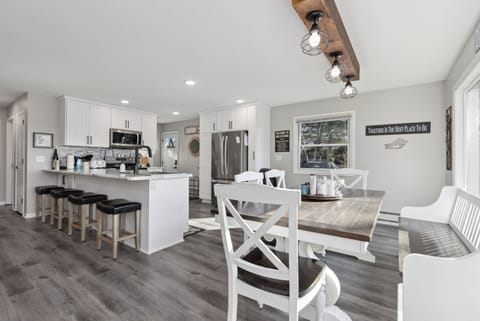 Open concept kitchen and dining room makes for easy conversations.