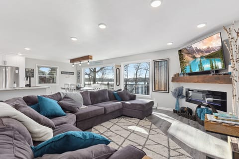 Another view of the open concept main floor with tons of seating options.