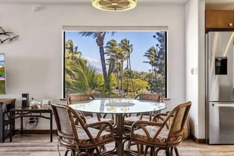 Dining table for four people with blade-less fan