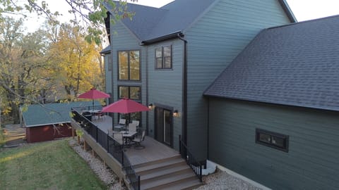 Lakeside deck spanning length of house