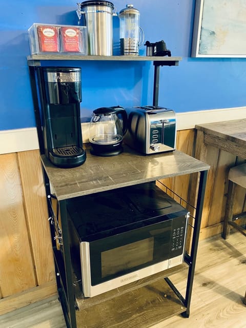 Downstairs kitchenette with microwave, coffee maker, toaster, electric kettle