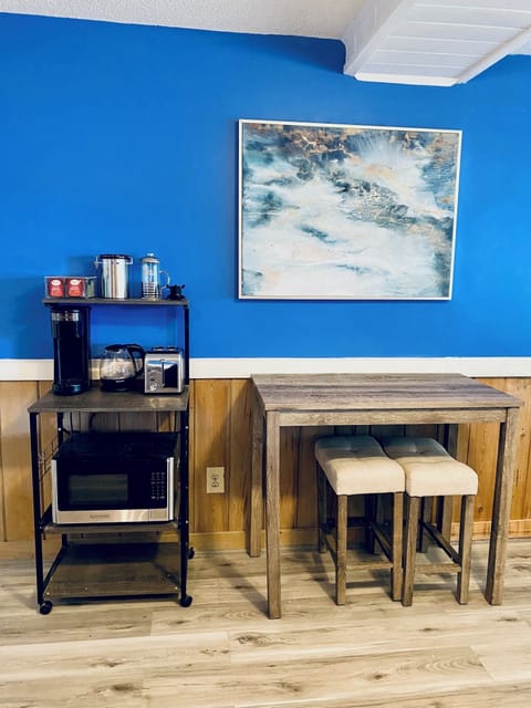 Downstairs kitchenette with microwave, coffee maker, toaster, electric kettle