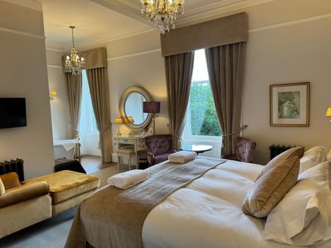 Rose Room | Blackout drapes, iron/ironing board, bed sheets