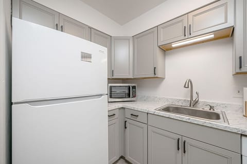 The kitchen is equipped with a refrigerator to keep your food fresh.