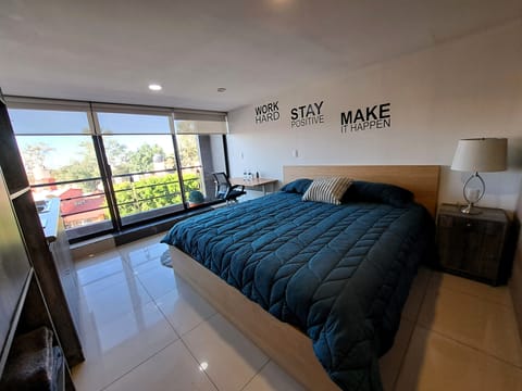 Executive Studio Suite, Balcony, City View | Premium bedding, in-room safe, desk, laptop workspace