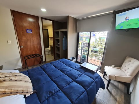 Deluxe Room, Balcony, City View | Premium bedding, in-room safe, individually decorated, desk