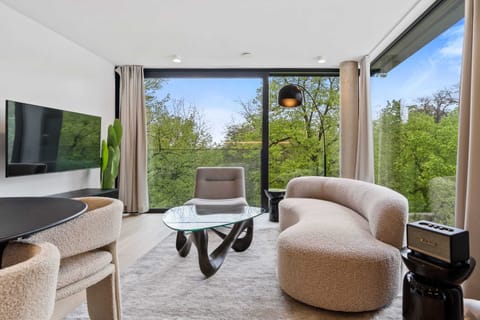 Lounge in style with panoramic views that bring the outdoors in.