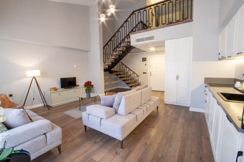 Exclusive Loft | Premium bedding, minibar, in-room safe, blackout drapes