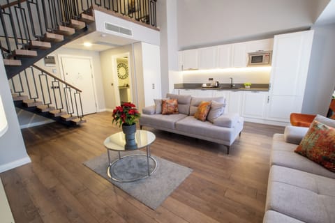 Exclusive Loft | Premium bedding, minibar, in-room safe, blackout drapes