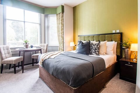 Comfy king bed and seating area