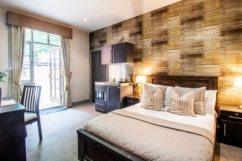 Double Bed, kitchenette access to private terrace