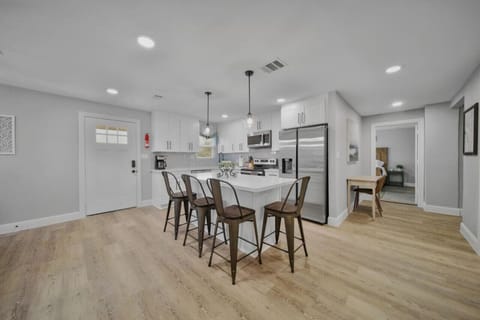 Unit B offers the convenience of a full kitchen, complete with a 4-seater island. Whether you`re preparing a quick snack or cooking a gourmet meal, this well-equipped space ensures you have everything you need for a comfortable stay.