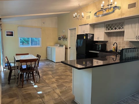 Kitchen with small dining room table (seats 4)