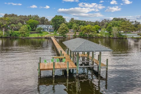 Private dock on the St. Johns River with covered pavilion and seating – perfect for relaxing, fishing, or launching kayaks