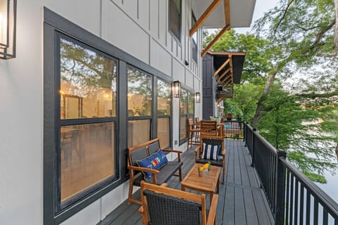 Enjoy stunning riverfront views from this Guadalupe River home! Your private balcony off the living room provides the perfect place to relax and take in the scenic beauty of the river.