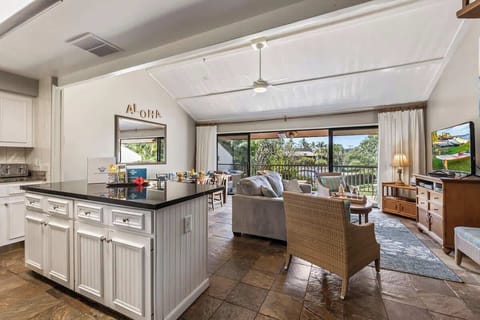 Open floor plan with spacious living area and kitchen 