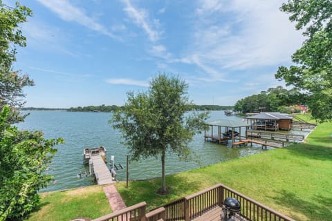 Backyard with private dock. Perfect for swimming, fishing, and relaxing!