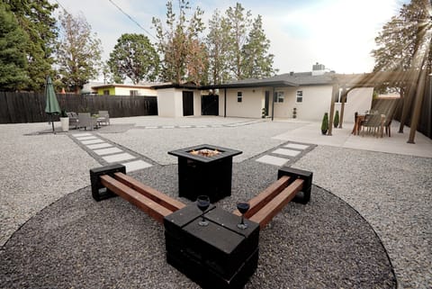One of the many lounging spaces this newly landscaped backyard has to offer. 